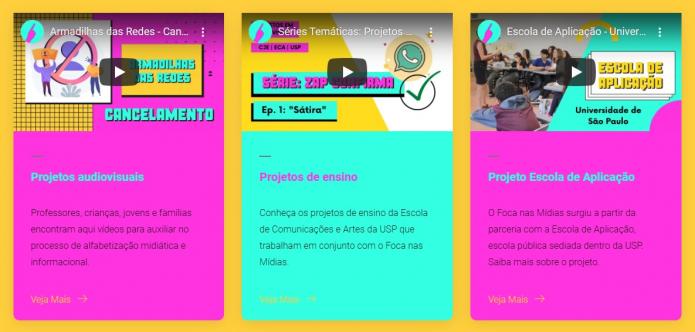 Print do site do Foca nas Mídias. Há três caixas de textos que apresentam links para os vídeos do canal do YouTube que explicam sobre os projetos do Foca nas Mídias: &quot;projetos audiovisuais&quot;, &quot;projetos de ensino&quot; e &quot;projeto Escola de Aplicação&quot;. O fundo da imagem é amarelo, e as caixas de texto são rosa e azul-esverdeado.