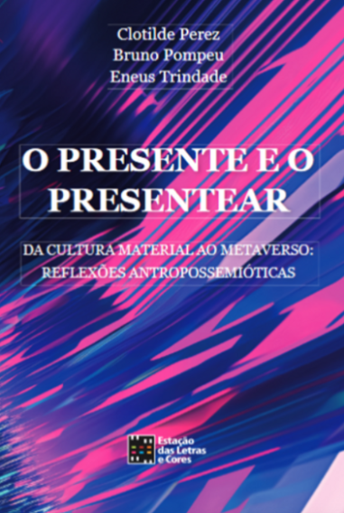 Capa do livro. O fundo é uma ilustração em que várias placas retangulares e tridimensionais, com predominância de tons fortes de azul e rosa, estão sobrepostas e em diagonal ascendente da esquerda para a direita. No centro em destaque o nome do livro em letras brancas. No topo, estão os nomes dos autores e, embaixo, o logotipo da editora.