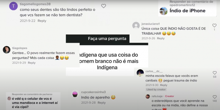 Trecho do documentário Comunidade Indígena e o Ciberespaço. Print de vários comentários de diferentes usuários em redes sociais. No centro da imagem, em destaque, encontra-se a caixa de perguntas do Instagram onde se lê: “Indígena que usa coisa do homem branco não é mais indígena”. Os comentários mostrados veiculam ideias preconceituosas em relação aos povos indígenas, que os classificam como preguiçosos e atrasados.