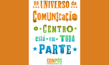 em um fundo laranja, uma formar retangular laranja, na cor branca, tem a seguinte frase: no universo da comunicação o centro está em toda a parte, escrita num degrade de cores laranja, verde, azul claro e azul escuro. Abaixo o texto compós, na mesma cor