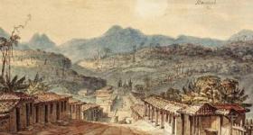 antiga pintura de uma rua de terra; de um lado e de outro da rua, casas semelhantes e uma ao lado da outra; ao fundo uma cadeia de montanhas