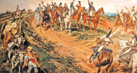 Parte da pintura Independência ou Morte. Na porção central superior está Dom Pedro I, homem branco em trajes reais que levanta sua espada e está montado em um cavalo marrom. Atrás dele estão homens brancos em vestes aristocráticas e militares montados em cavalos. Alguns levantam seus chapéus e espadas. Na porção esquerda, um homem na grama observa a cena perplexo. Ele está descalço, veste roupas simples e desgastadas, usa chapéu de palha e conduz alguns bois. No canto direito, há outros militares em cavalos