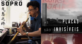 Montagem feita com os dois cartazes dos filmes tratados na notícia em formato vertical justapostos. O primeiro pertence ao cusrta Até o Último Sopro, no qual consta um homem asiático tocando um instrumento de sopro. O seguinte pertence ao documentário As Placas São Invisíveis no qual consta, na parte superior, uma foto vista de cima da Universidade de São Paulo em preto e branco e, na parte dei baixo, uma foto cortada de três mulheres negras. 